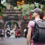 traveler-walking-on-busy-street-in-hanoi.jpg